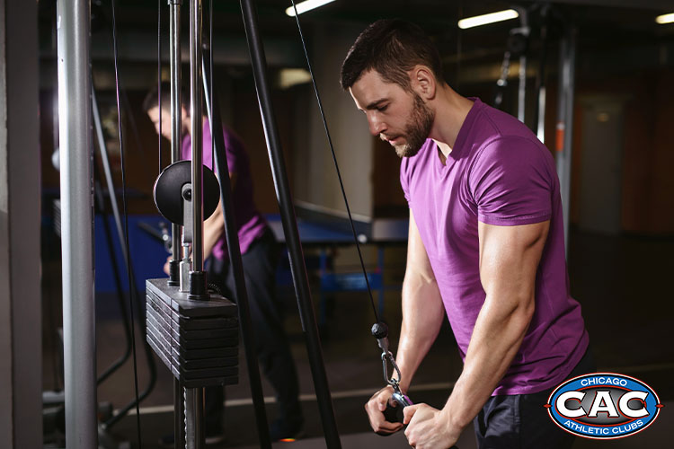 Man doing a tricep extension 