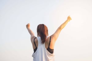 Girl pumping arms in victory