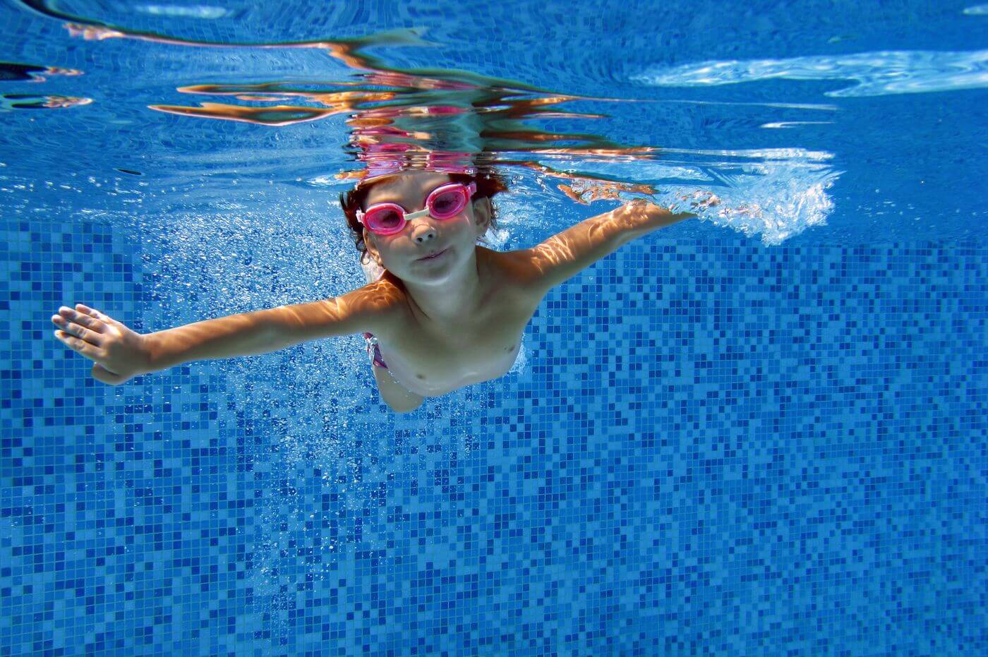 Kid Swimming in pool_tn