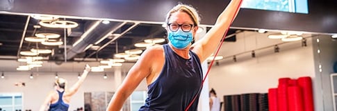 Smiling workout with mask on 600x200-1-1