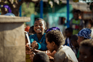 WFW Smiling child with water